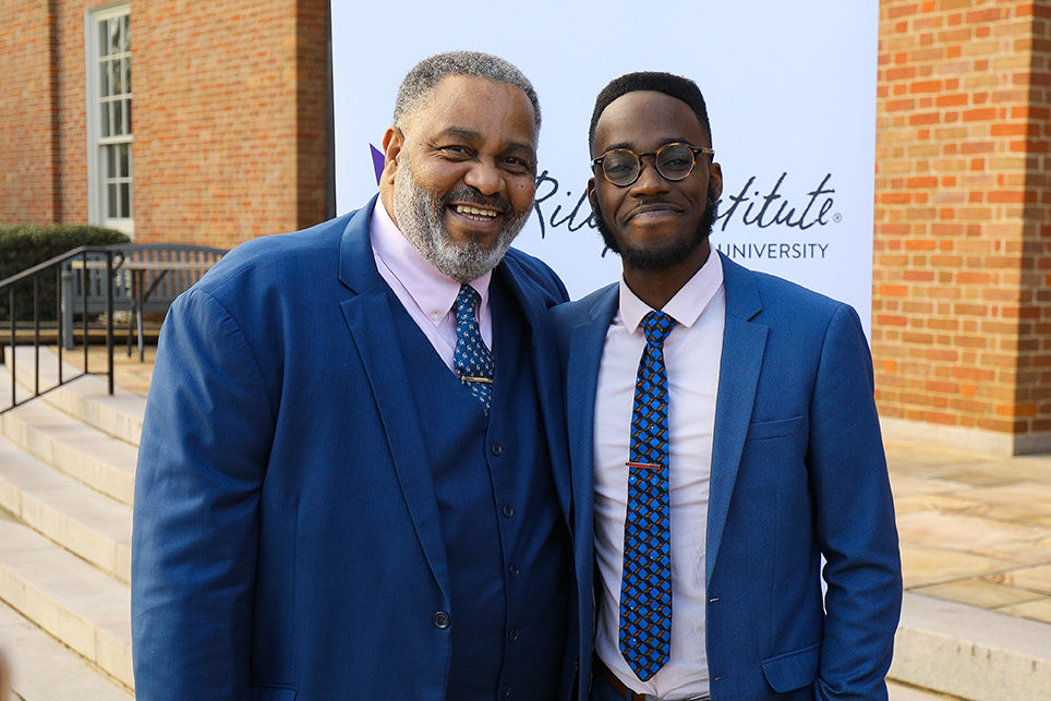 Anthony Ray Hinton, left, poses with Jonathan Kubakundimana '16 of the Equal Justice Initiative