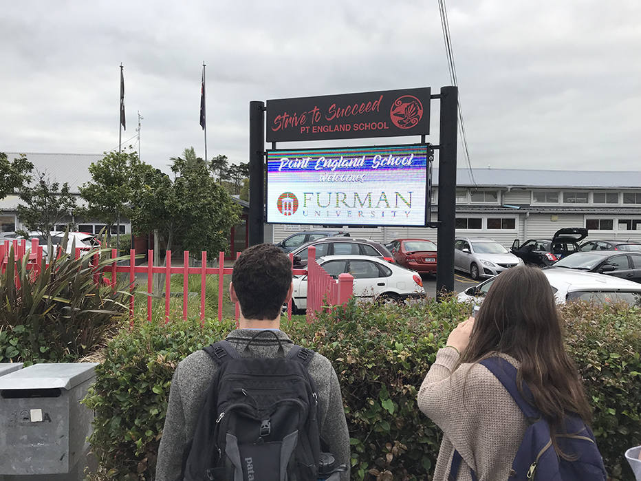 A sign welcoming Furman students to PT England School in Auckland, New Zealand
