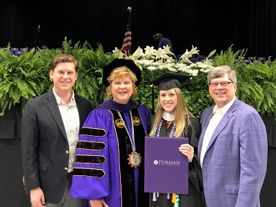 family of four at graduation 2019, Chad, Elizabeth, Clair '19 and Charles Davis